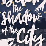 Below the Shadow of the City